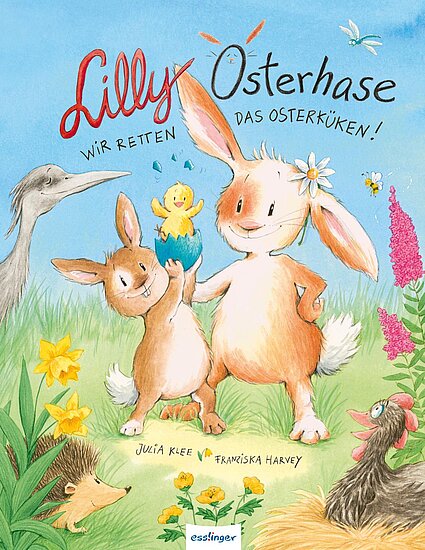 Das Buchcover zeigt zwei freundliche Hasen auf grünem Gras, ein Küken in blauer Schale, gelbe Narzissen und blauer Himmel.