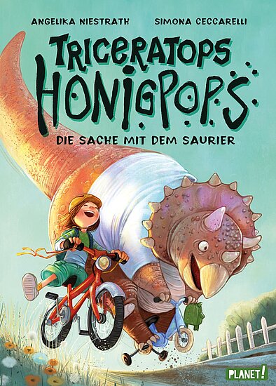 Das Buchcover zeigt einen Jungen auf einem Fahrrad, der lachend von einem Triceratops verfolgt wird. Die Farben sind lebhaft und fröhlich, mit einer bunten Landschaft im Hintergrund.