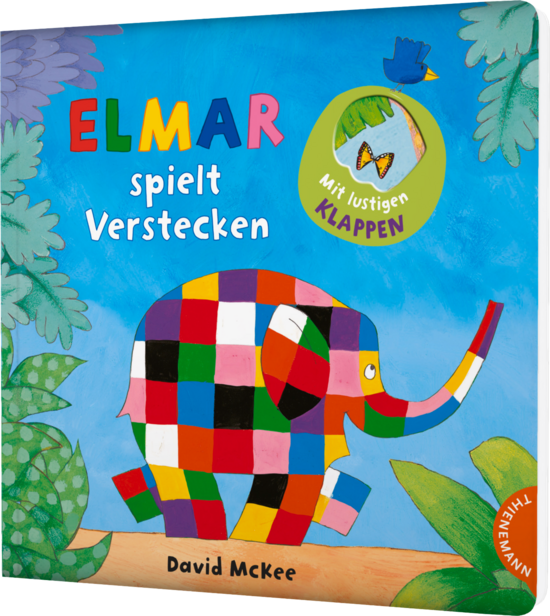 Das Buchcover zeigt den bunten Elefanten Elmar, der im Vordergrund steht, umgeben von grünen Pflanzen und einem blauen Himmel. Oben sind die Wörter „ELMAR spielt Verstecken“ in kräftigen Farben platziert.