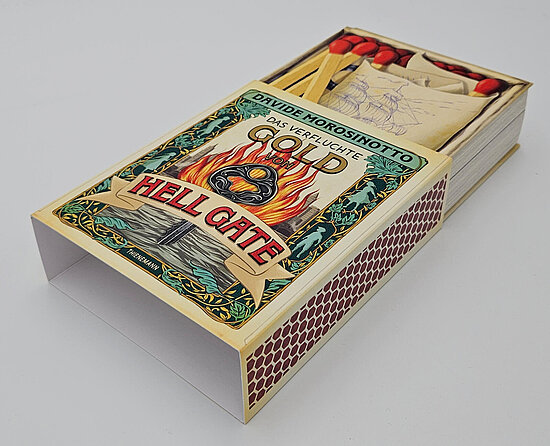 Das Buchcover zeigt eine offene Streichholzschachtel mit einem brennenden Herzmotiv, Flammen, grünem Floralrahmen und roten Streichholzköpfen.