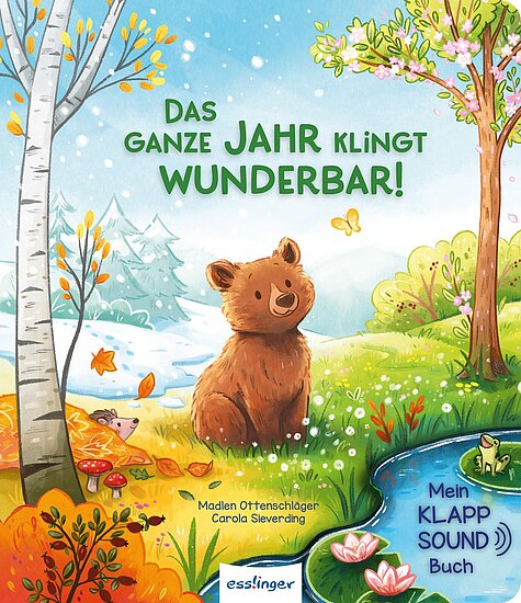 Das Buchcover zeigt einen niedlichen Bären im Mittelpunkt, umgeben von bunten Bäumen, Blumen und einem plätschernden Bach. Die Farben sind hell und freundlich, mit einem überwiegenden Blau- und Grünton.