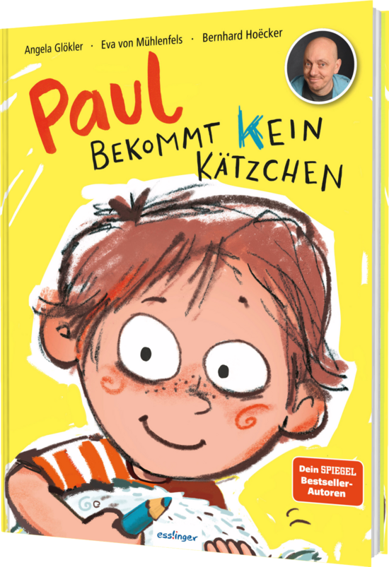 Das Buchcover zeigt einen fröhlichen Jungen mit braunen, wilden Haaren und einem breiten Lächeln, der einen Stift in der Hand hält. Der Hintergrund ist leuchtend gelb, und der Titel „Paul bekommt KEIN Kätzchen“ ist prominent in rot und blau dargestellt.