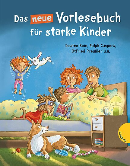 Das Buchcover zeigt drei fröhliche Kinder in einem bunten Schlafzimmer. Eines liest im Bett, während ein Hund und ein niedliches Kaninchen da sind.