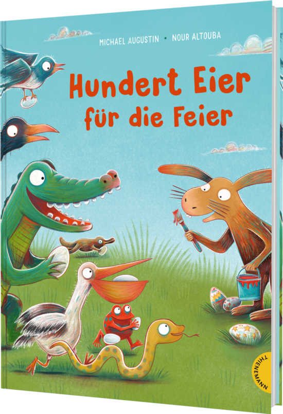 Das Buchcover zeigt eine farbenfrohe Szene mit einem Krokodil, einem Hasen und verschiedenen Vögeln, die um einen roten Eierkorb versammelt sind. Der Hintergrund ist hellblau und grün, was die fröhliche Stimmung der Feier unterstreicht.